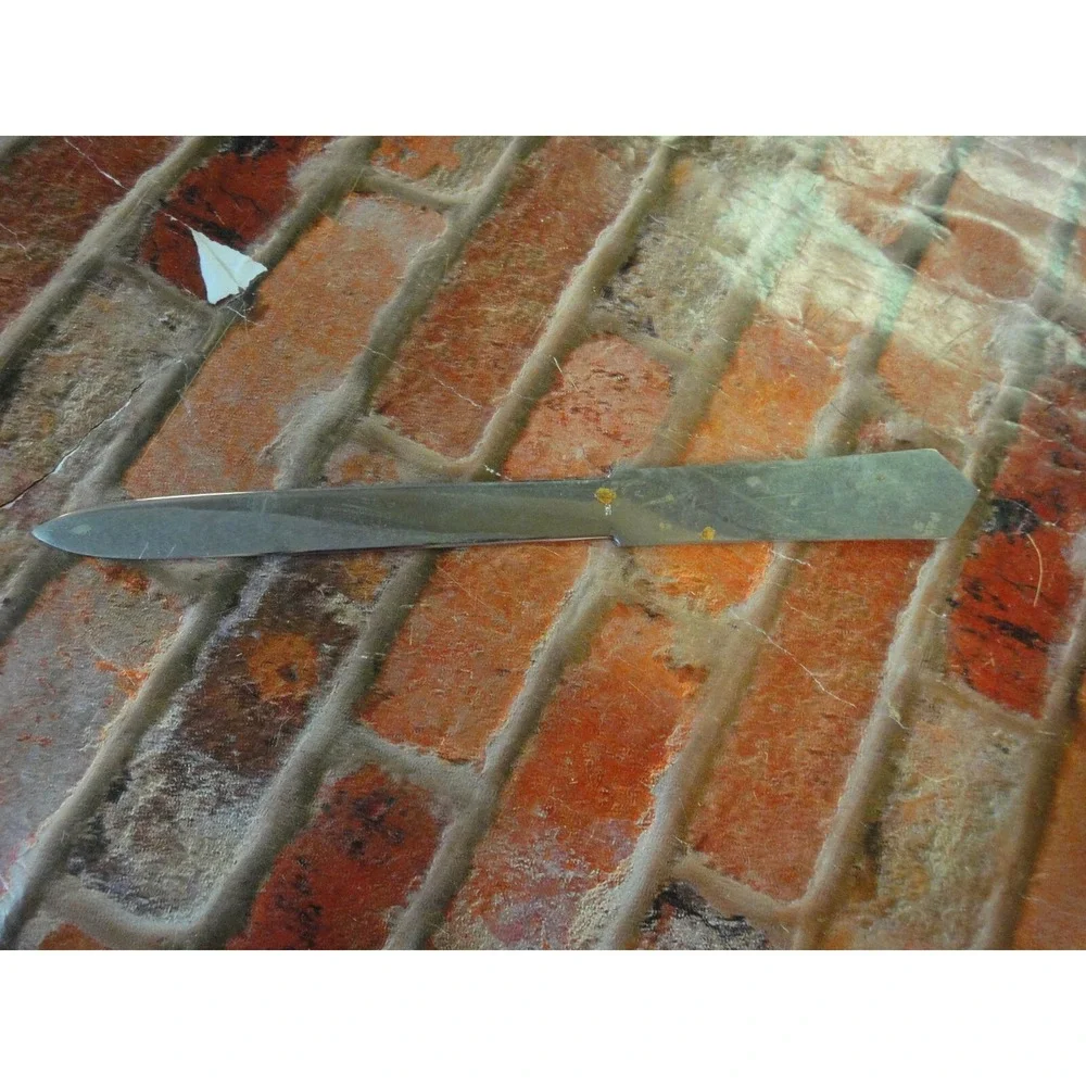 Italy stamped letter opener with CCC and golf clubs symbol estate find